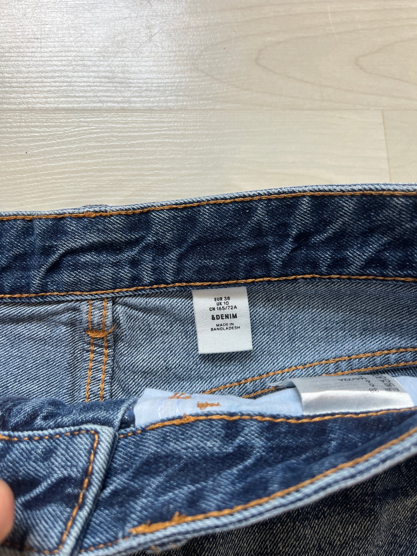 Mini jupe en jean bleu brut effet déchiré H&M - 38