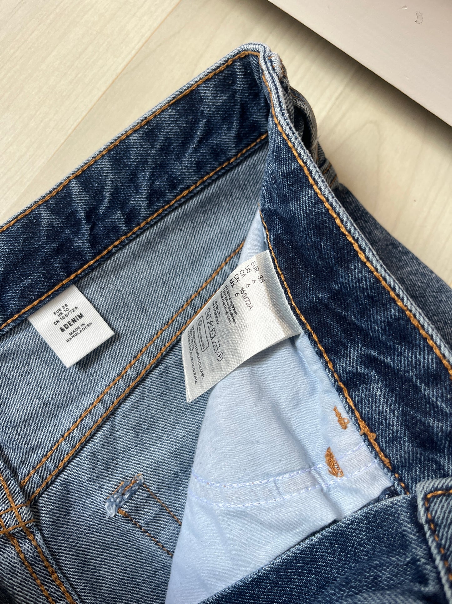 Mini jupe en jean bleu brut effet déchiré H&M - 38
