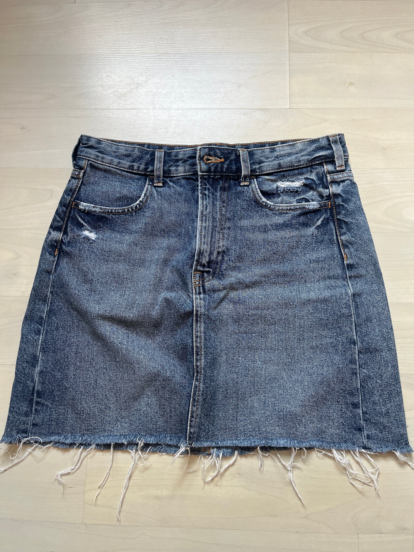 Mini jupe en jean bleu brut effet déchiré H&M - 38