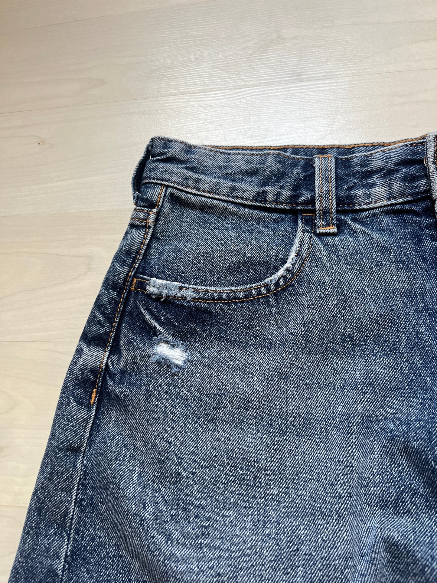 Mini jupe en jean bleu brut effet déchiré H&M - 38