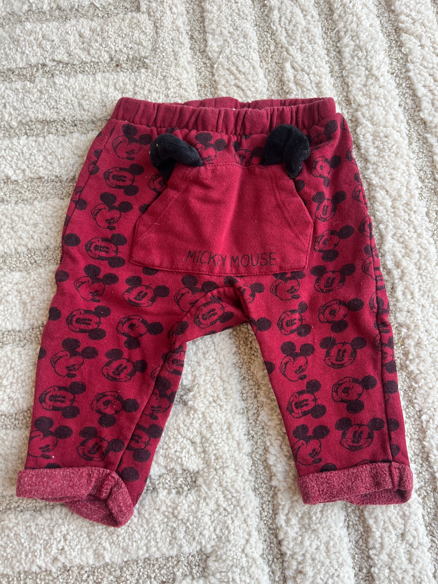 Pantalon rouge avec ourlets et poches Mickey - 6 mois