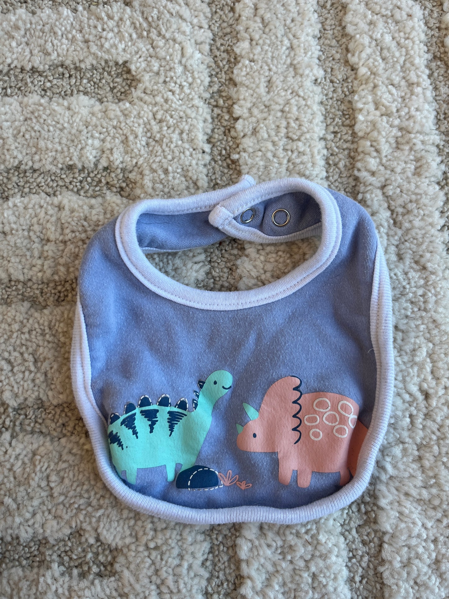 Bavoir bleu dinosaures - 0/3 mois