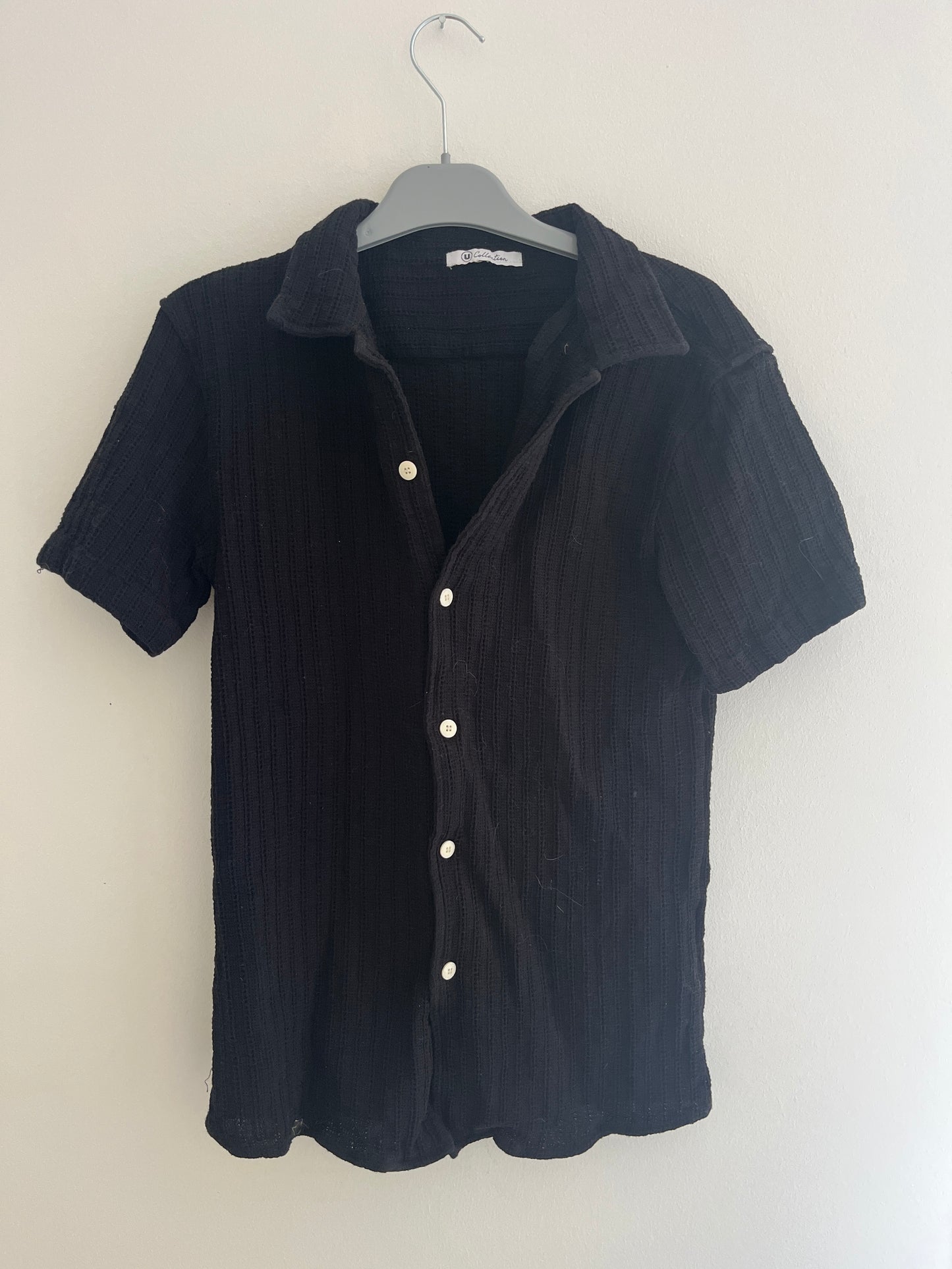 T-shirt à manches courtes noir en maille gaufrée - M