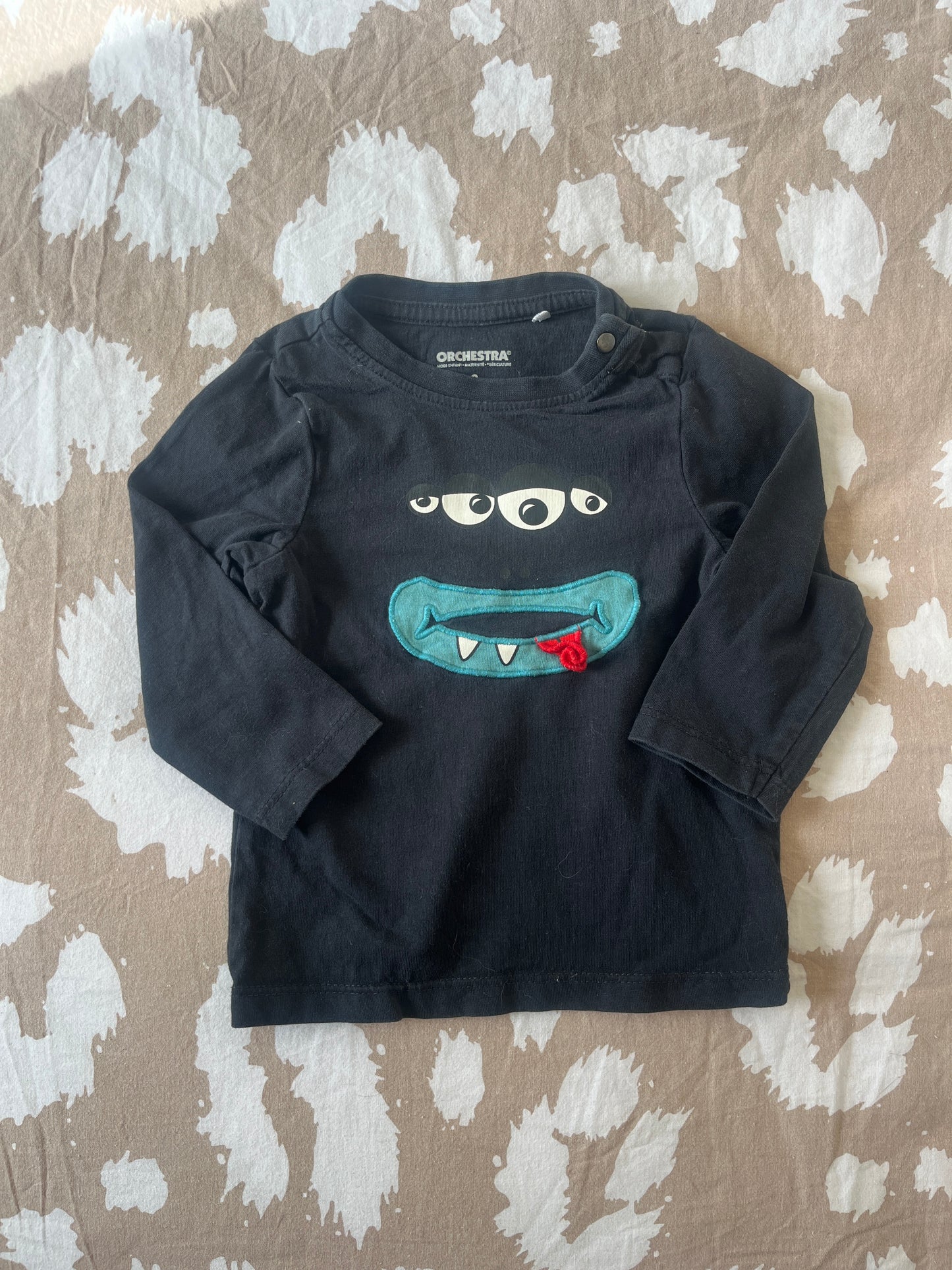 T-shirt à manches longues noir avec visage de monstre - 9 mois