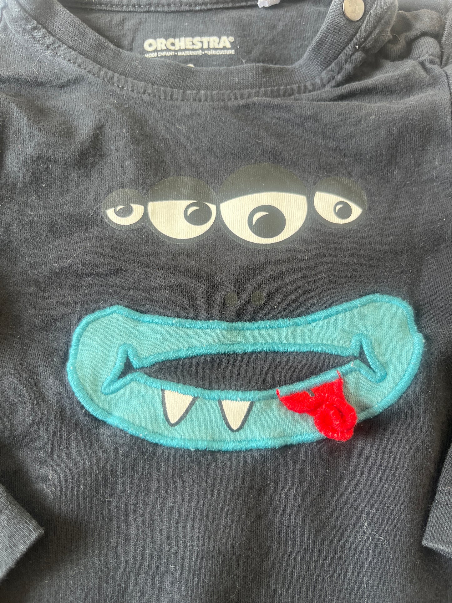 T-shirt à manches longues noir avec visage de monstre - 9 mois