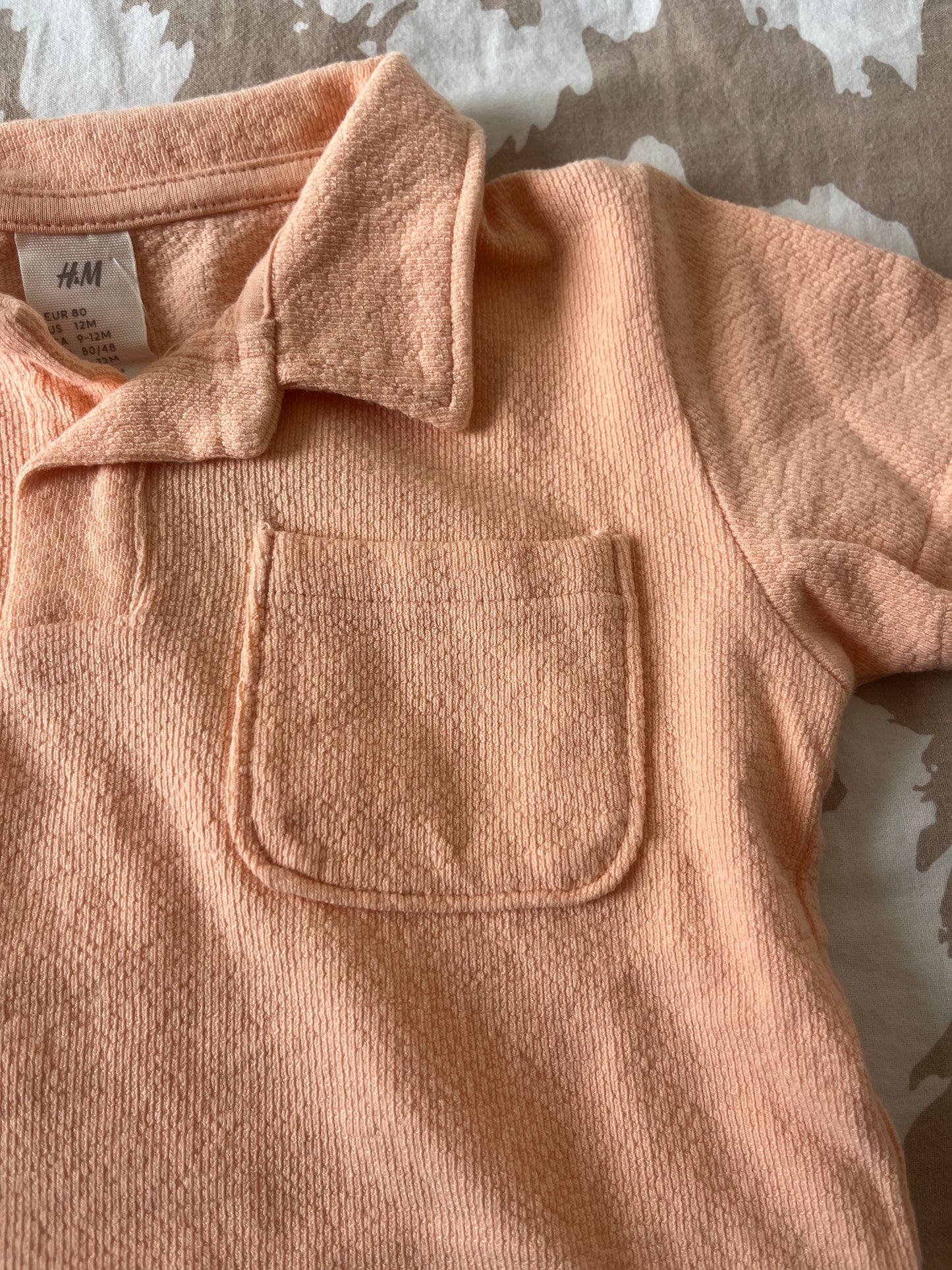 Polo manches courtes pêche matière éponge H&M - 80cm