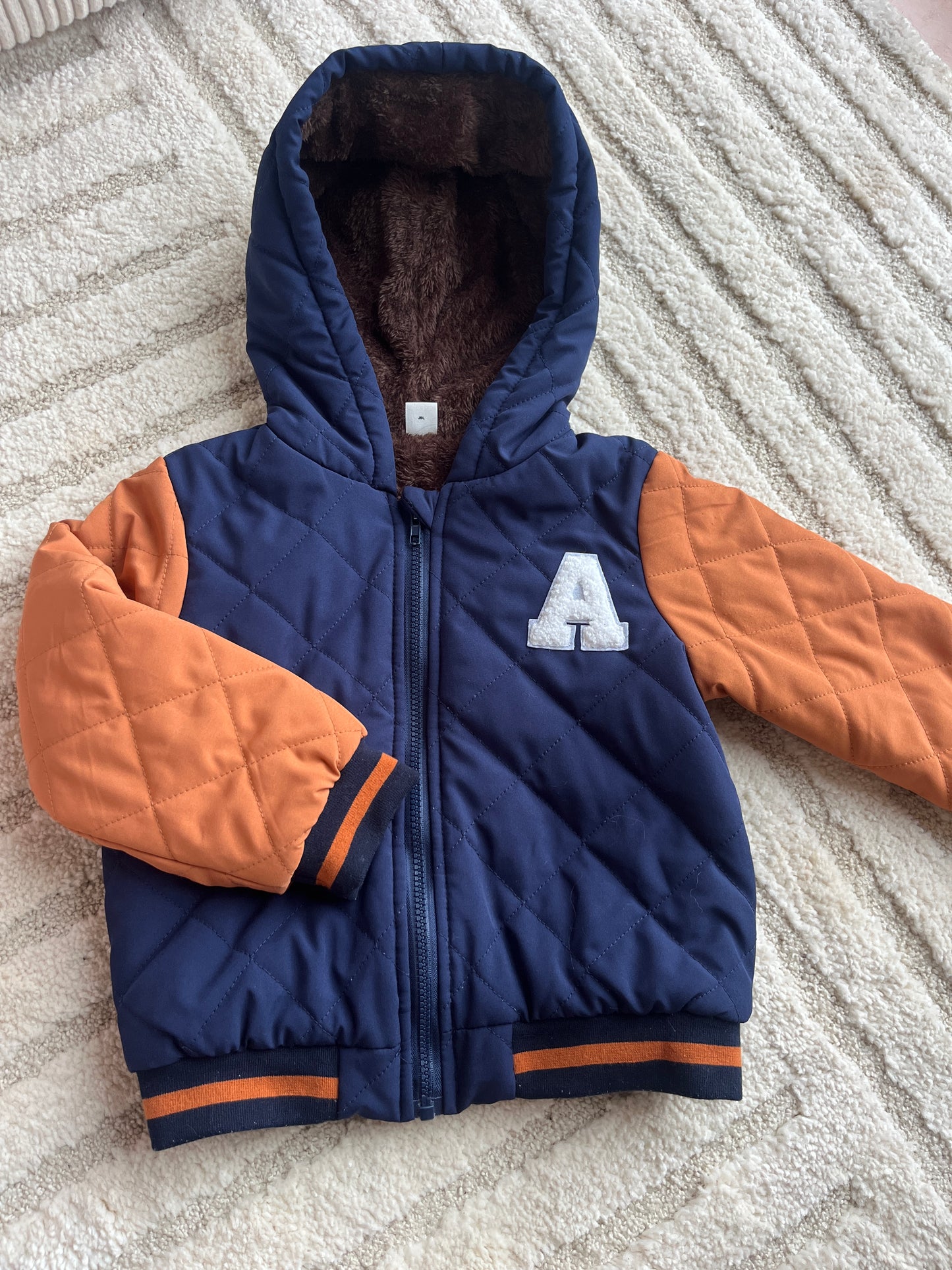 Blouson matelassé orange et bleu « A » - 6 ans