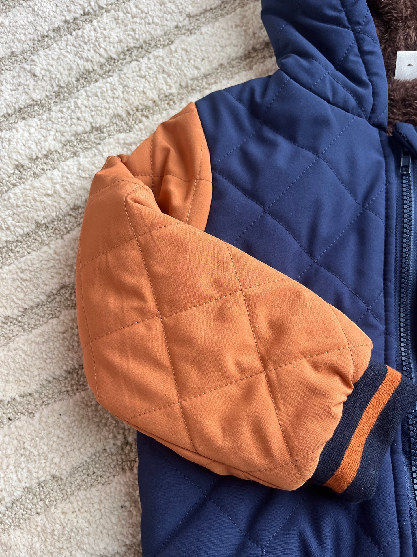 Blouson matelassé orange et bleu « A » - 6 ans