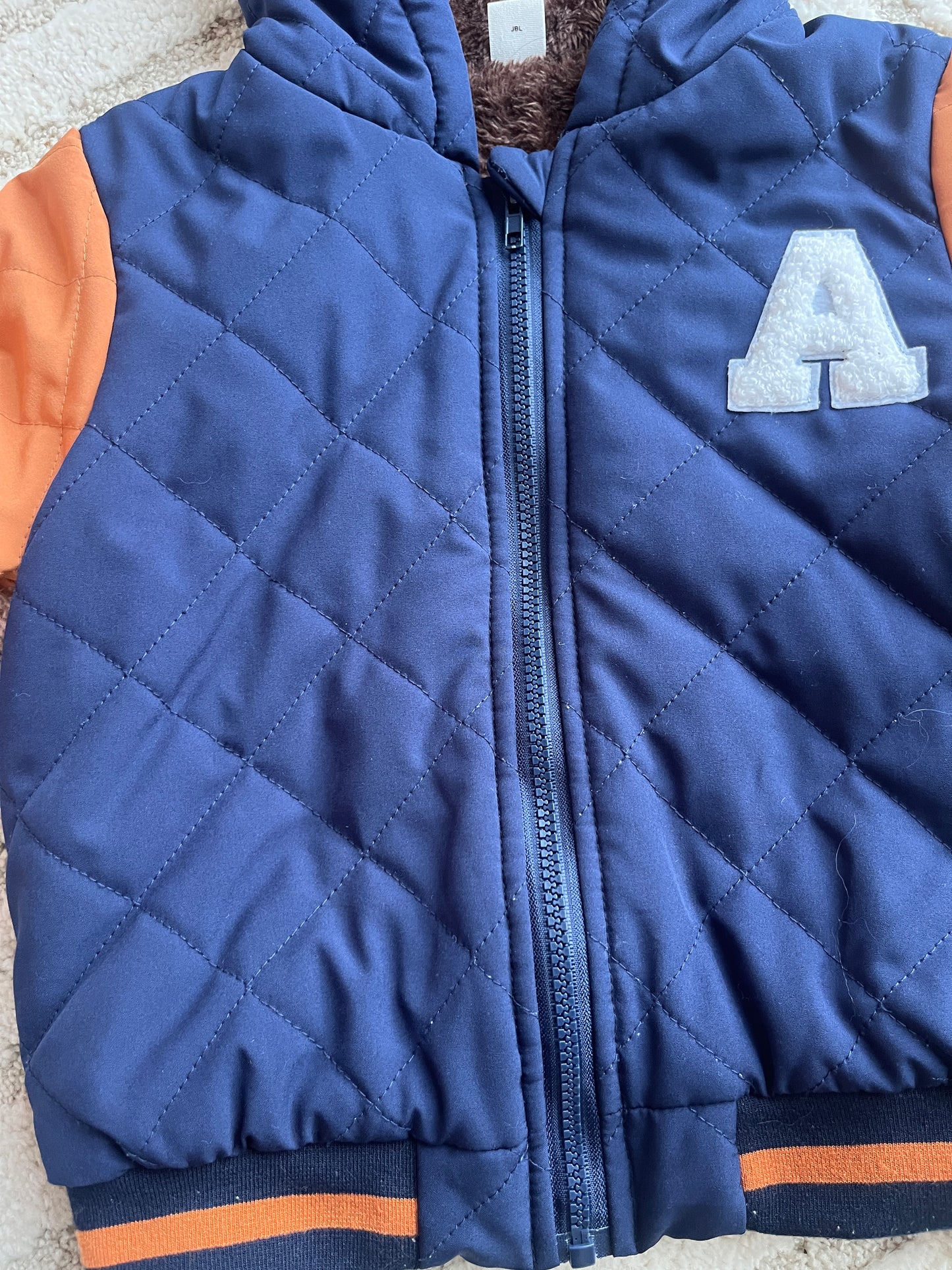Blouson matelassé orange et bleu « A » - 6 ans