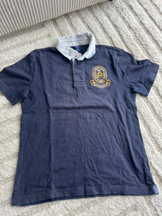 Polo à manches courtes noir avec blason jaune GAP - 10/11 ans