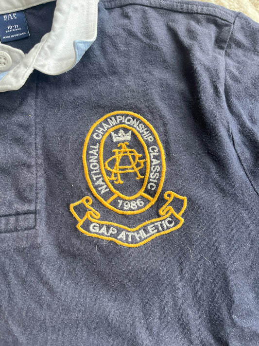 Polo à manches courtes noir avec blason jaune GAP - 10/11 ans