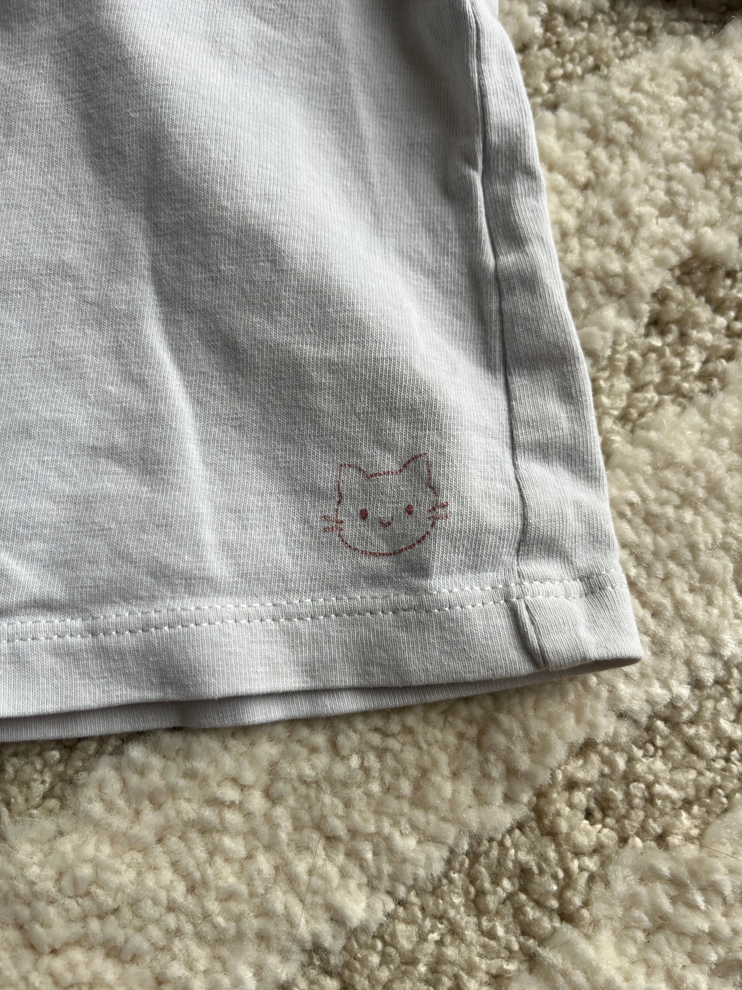 T-shirt à manches longues gris clair avec col roulé et tête de chat à paillettes - 3 mois