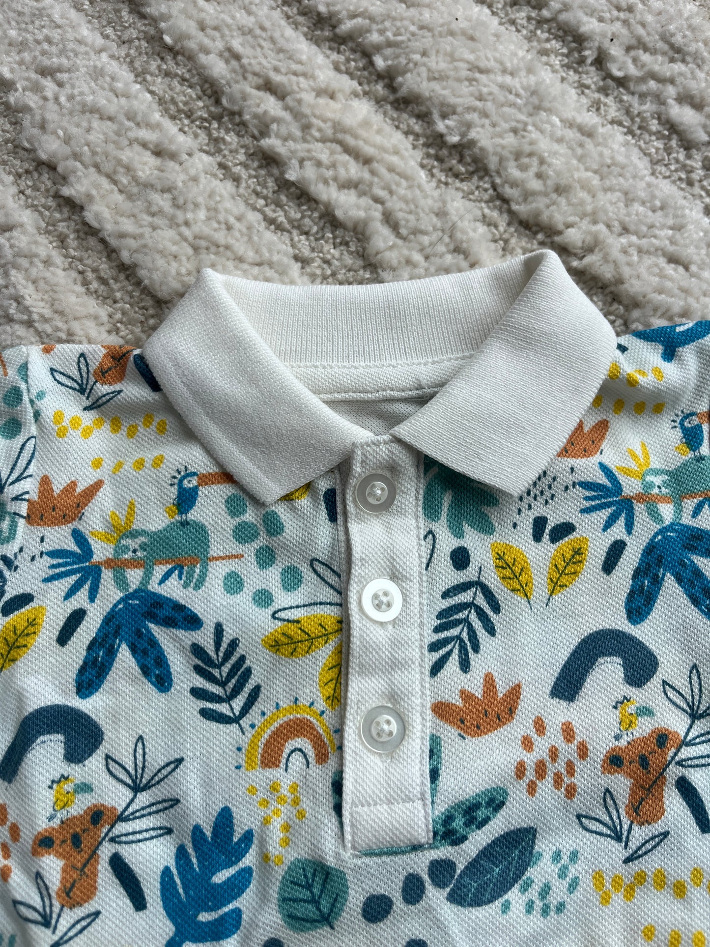 Polo à manches courtes blanc motifs feuilles - 6 mois