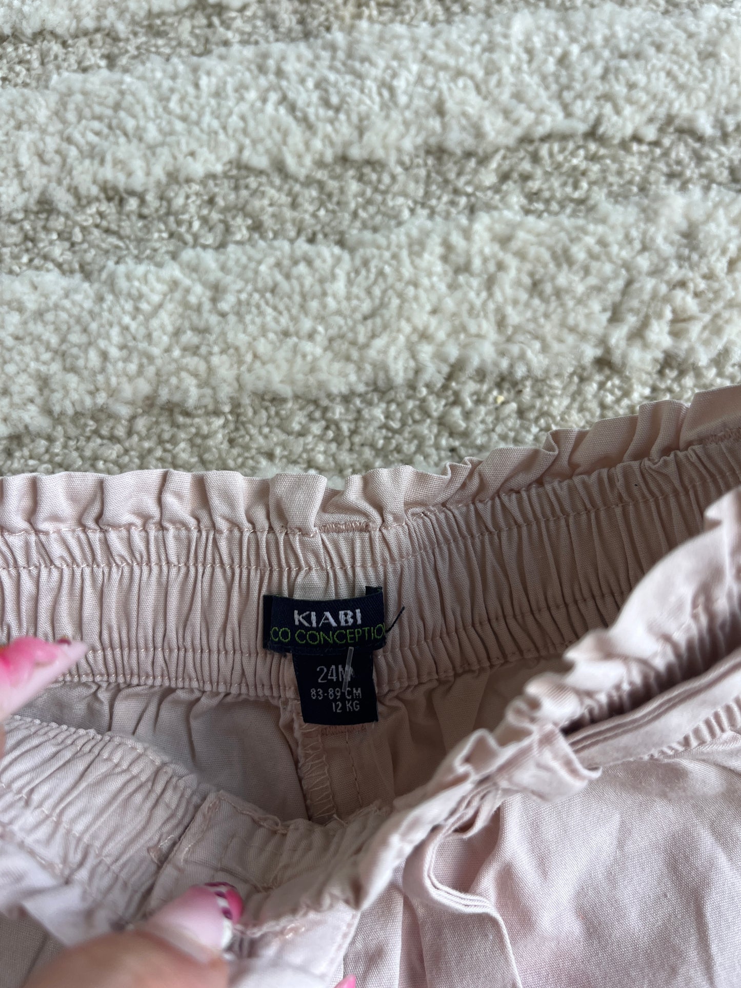 Short rose pale avec ceinture Kiabi - 24 mois